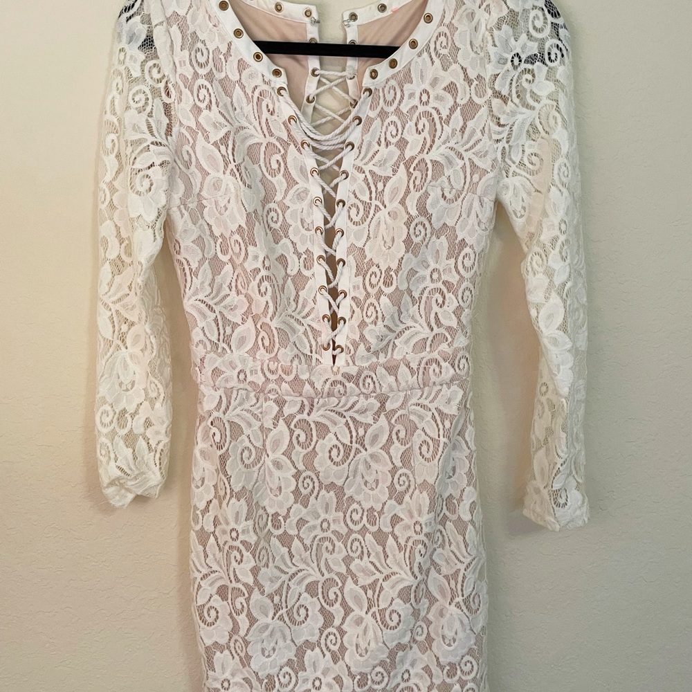 Bodycon white and cream lace long sleeve dress.